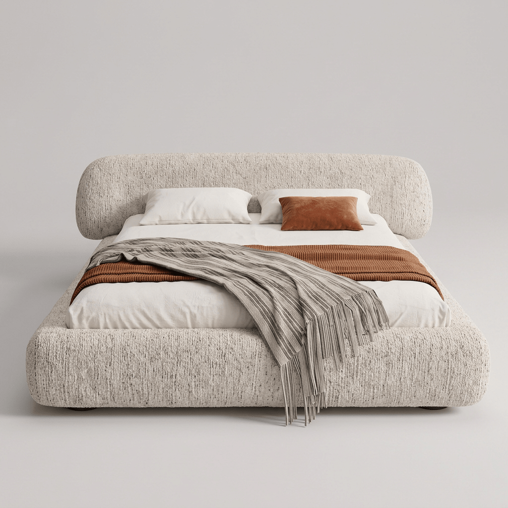 Cama estofada com cabeceira em curva e base espessa de bordas arredondadas, vista frontal