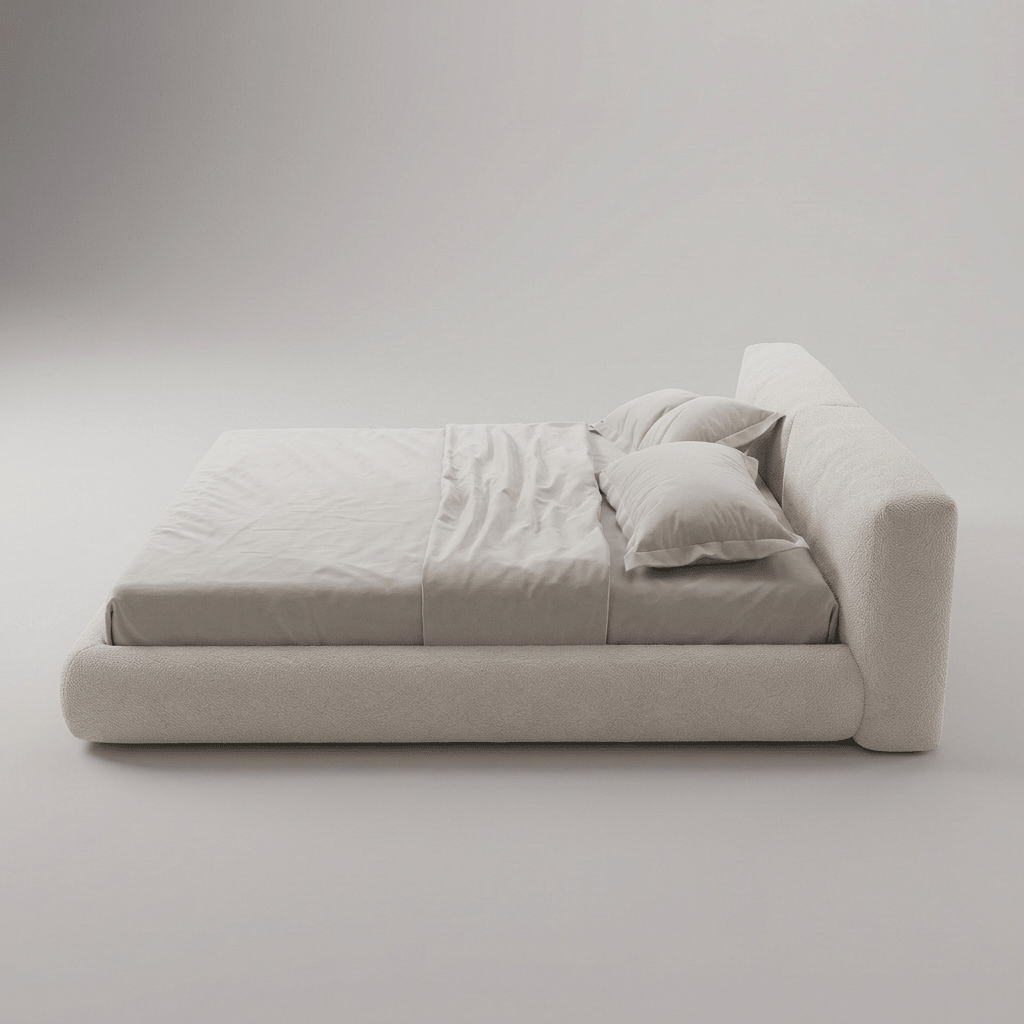 Cama estofada baixa vista de lado, com cabeceira espessa e base rente ao chão