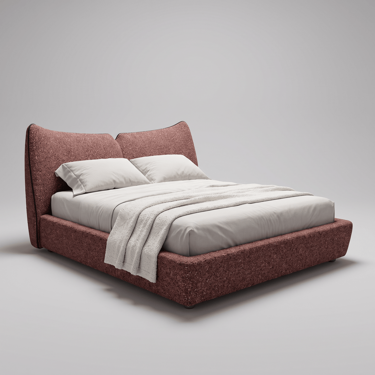 Cama estofada de volumes arredondados vista em perspectiva, com base apoiada em pés recuados
