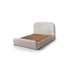Cama estofada com cabeceira alta e box com revestimento claro, estilo acolchoado
