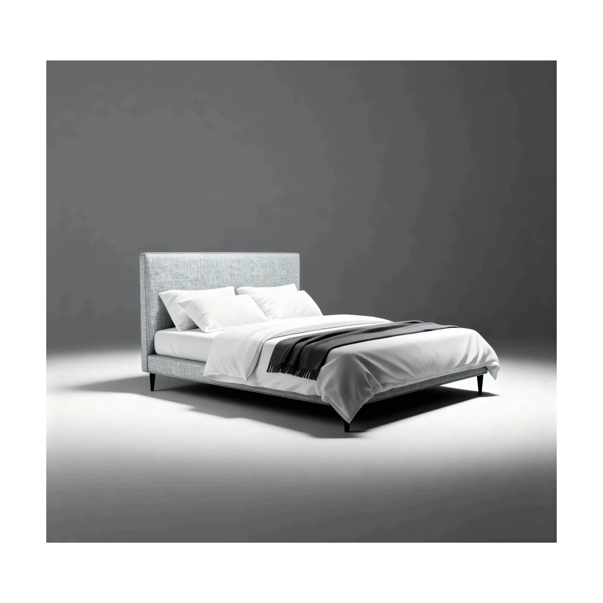 Cama com estrutura estofada cinza claro, cabeceira retangular e pés pretos, com mantas