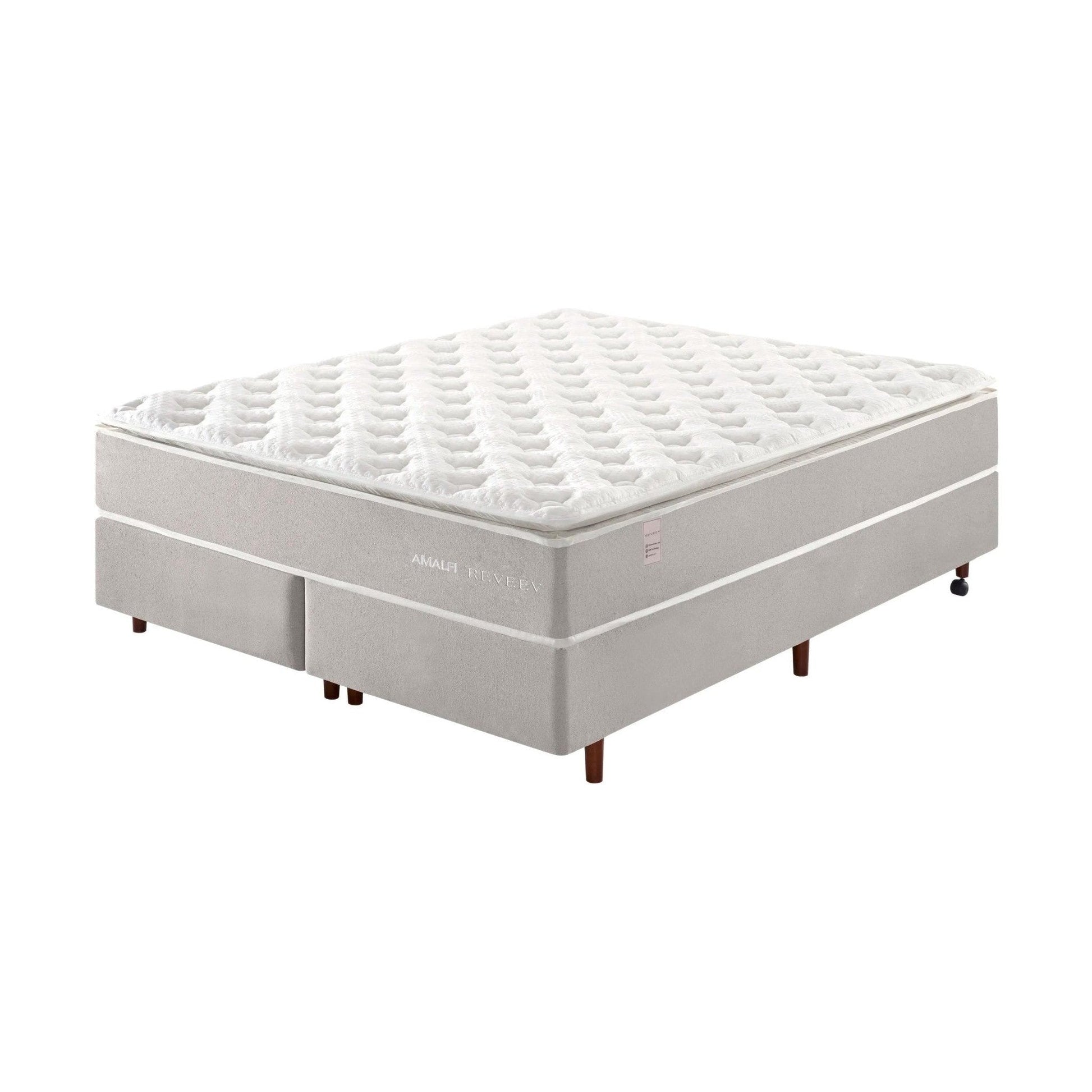 Colchão Amalfi com base cinza e topo acolchoado branco, com pés.