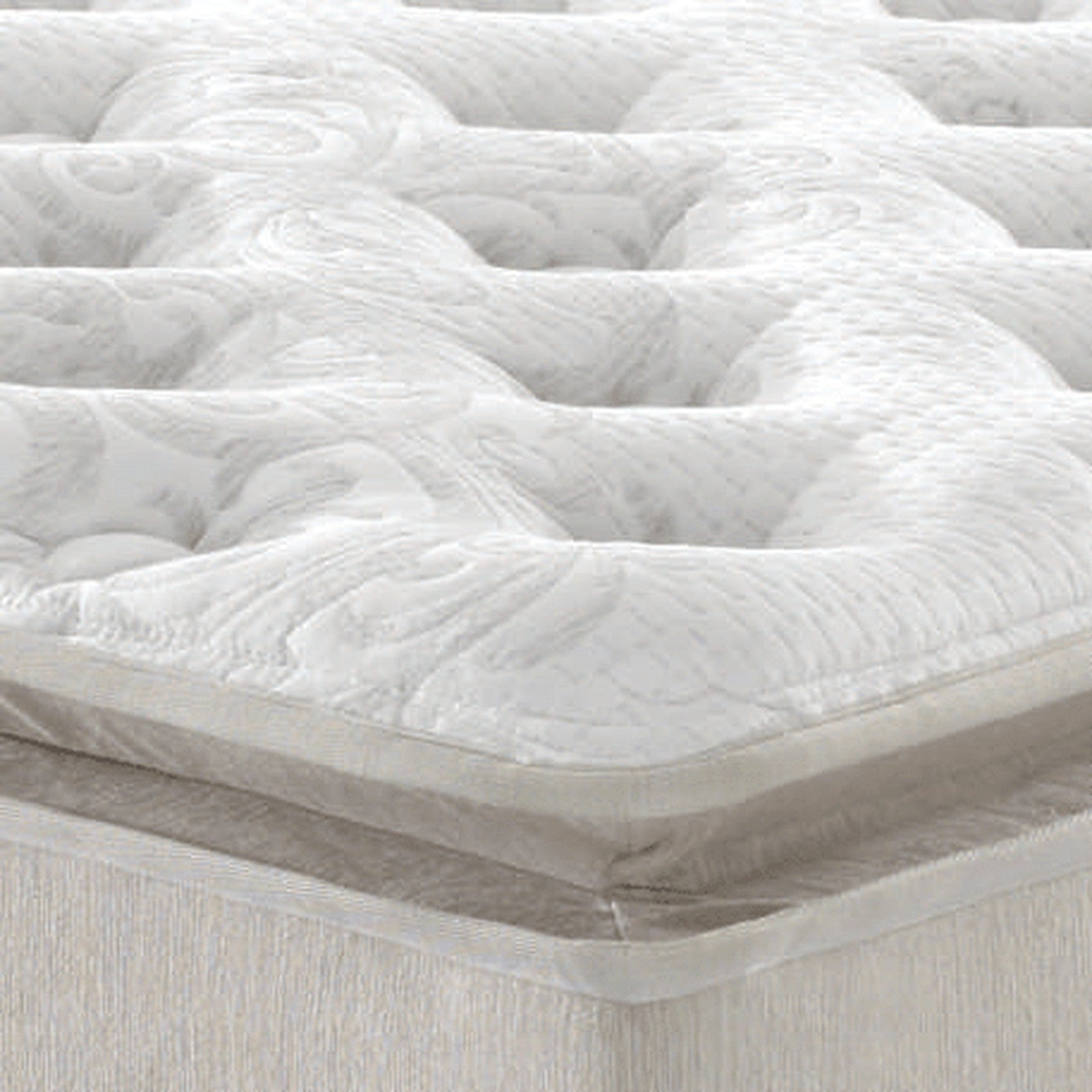 Colchão branco com tecido superior acolchoado e textura em relevo