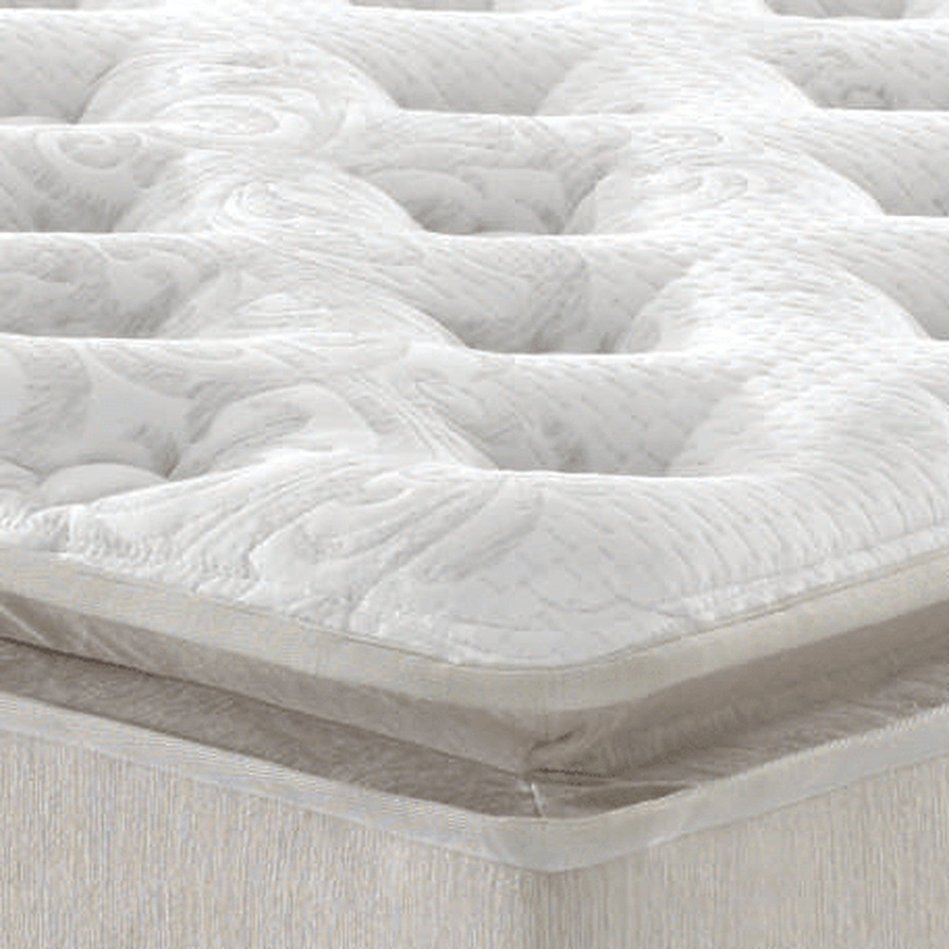 Colchão branco com tecido superior acolchoado e textura em relevo