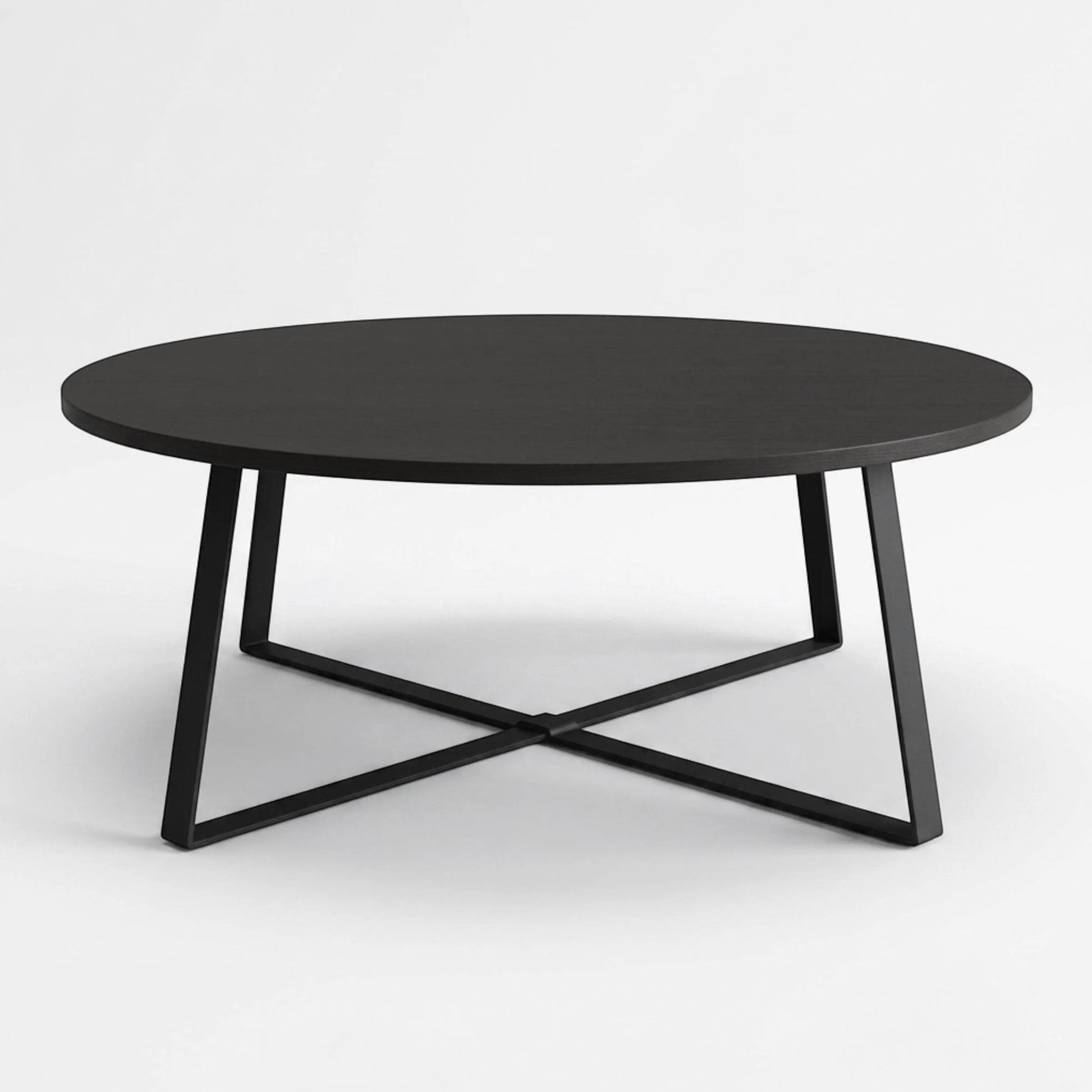 Horizon Interiores Zari Round black lacquered MDF coffee table with X-shaped base, 80cm diameter.