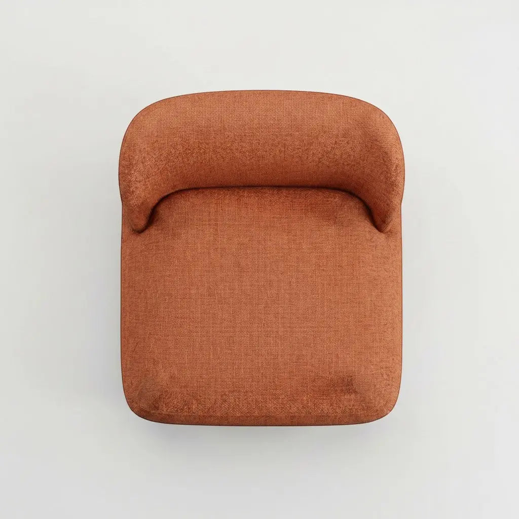 Horizon Interiores terracotta bouclé fabric armchair with rounded organic shape and no arms.