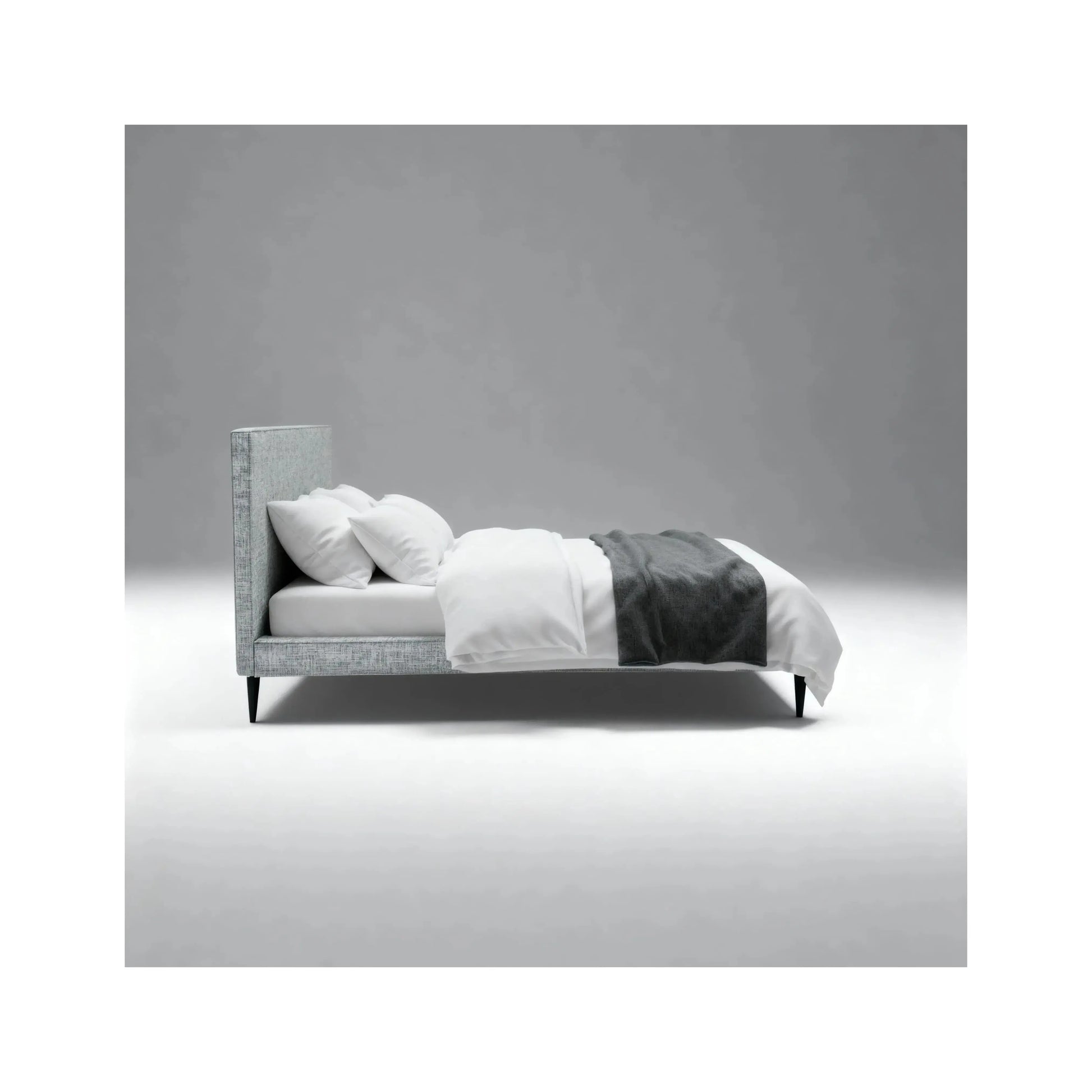 Cama Isla – cama estofada com pés esguios e design orgânico leve