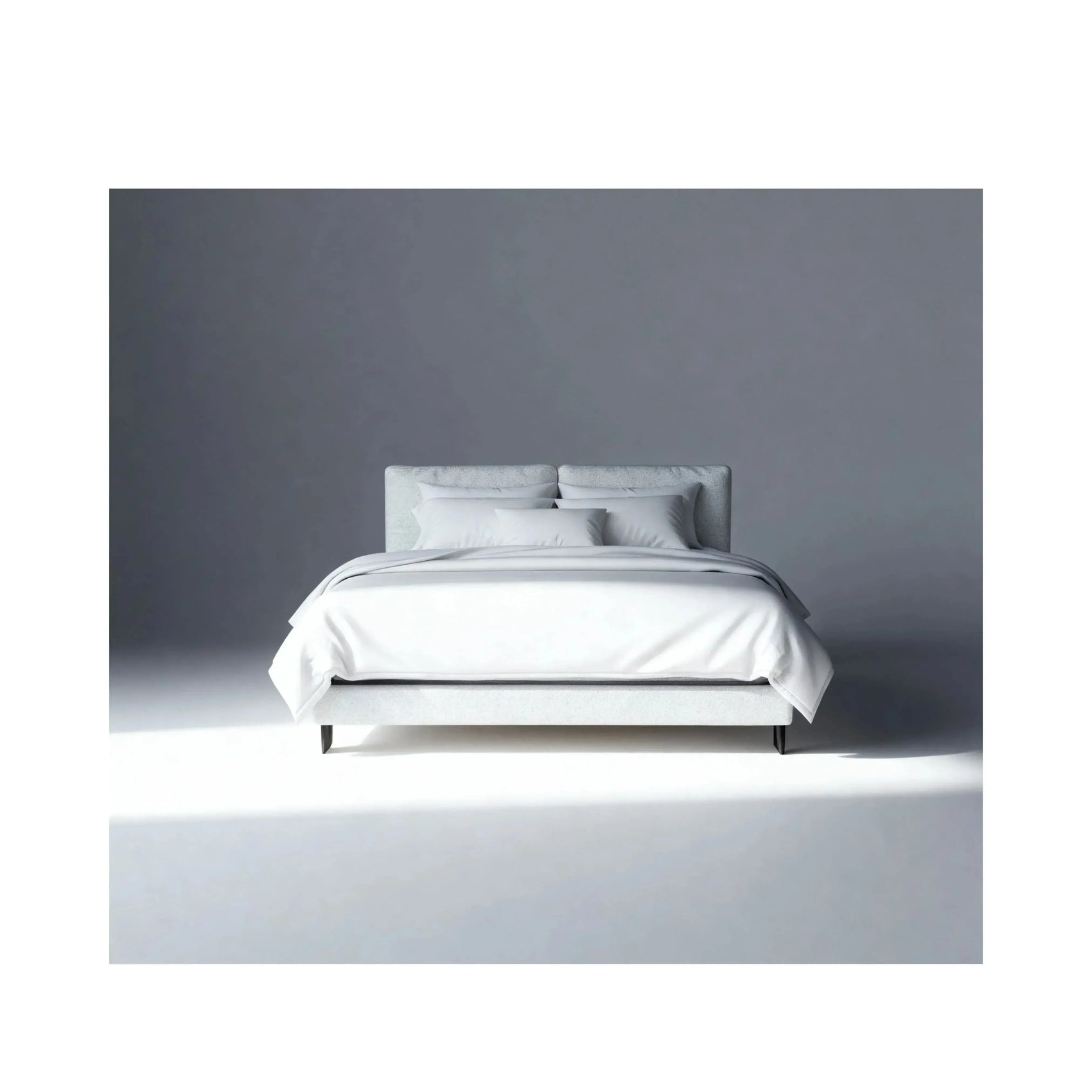 Cama Kairo – cama estofada retilínea com pés de aço pintados e almofadas soltas