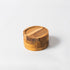 Porta-copos redondo de madeira teca maciça com faixas de textura