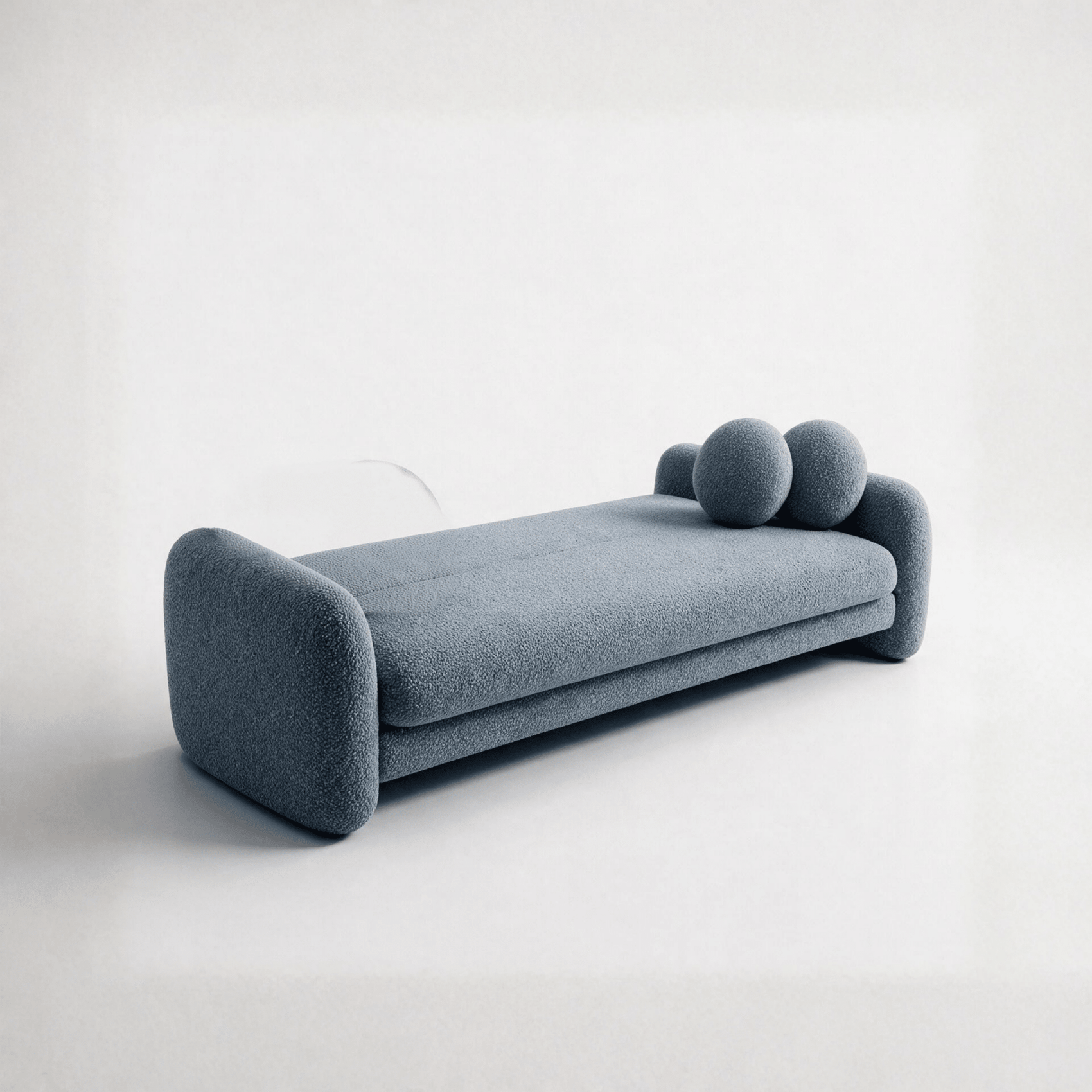 Sofá-cama azul escuro aberto, com assento amplo e três almofadas arredondadas
