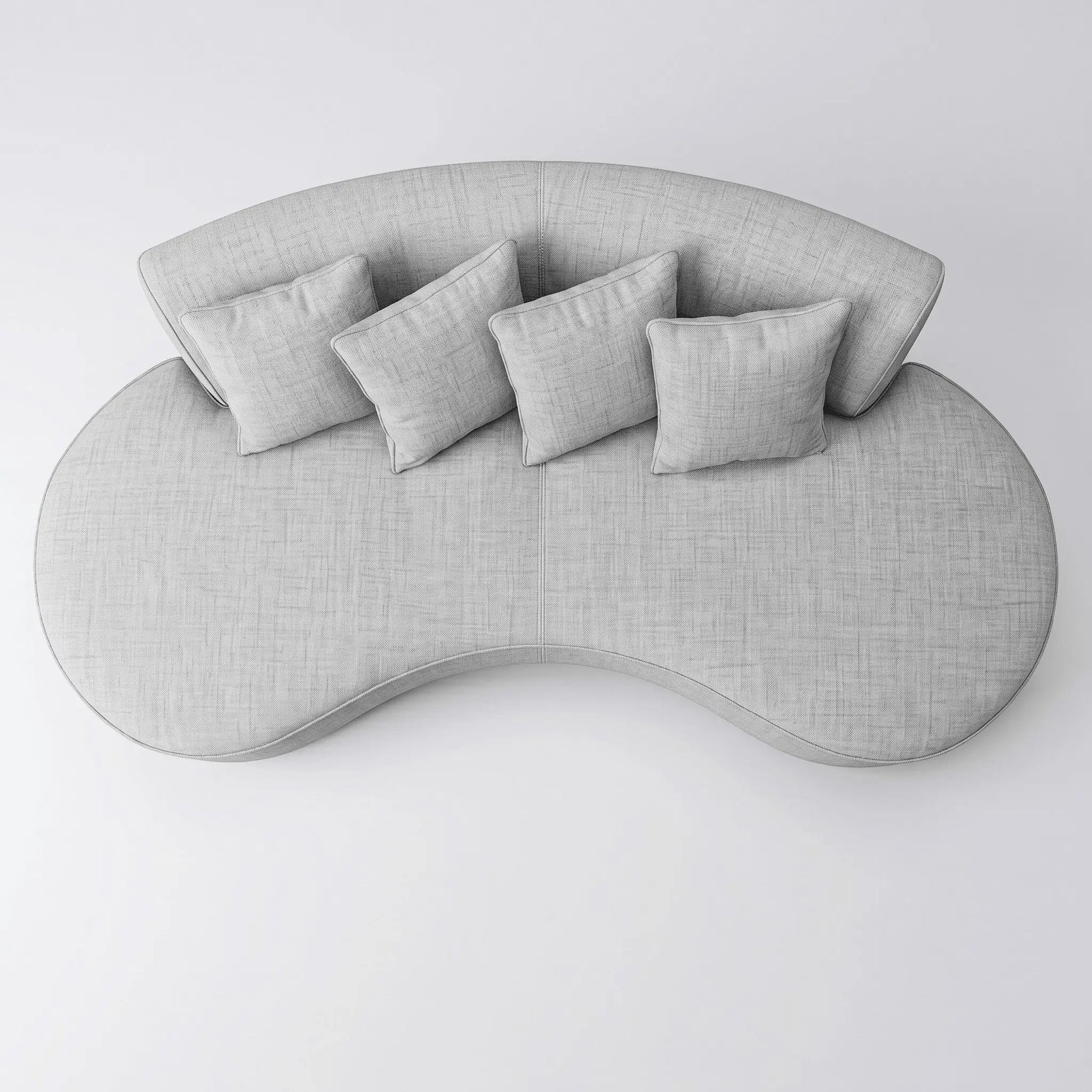 Sofá modular curvado com assento em formato ondulado e almofadas cinza claro